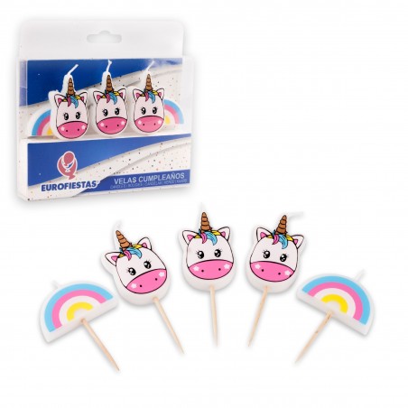Candele unicorno con arcobaleni