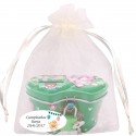 Salvadanaio per bambini in colori assortiti in un sacchetto di organza beige personalizzato con un adesivo