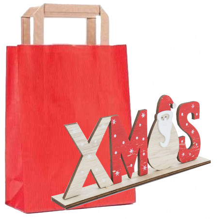 Ornamento natalizio per il tavolo del soggiorno presentato come regalo in un sacchetto rosso