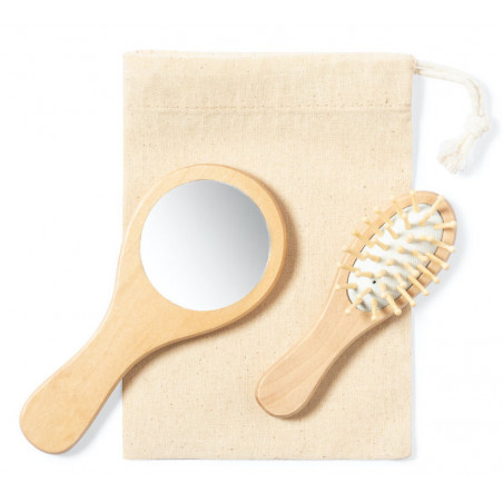 Spazzola e specchio da mano realizzati in legno con decorazione con adesivo di un bambino.