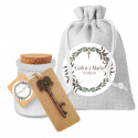 Candela bianca con apri chiave come souvenir con biglietto personalizzabile in sacchetto di stoffa