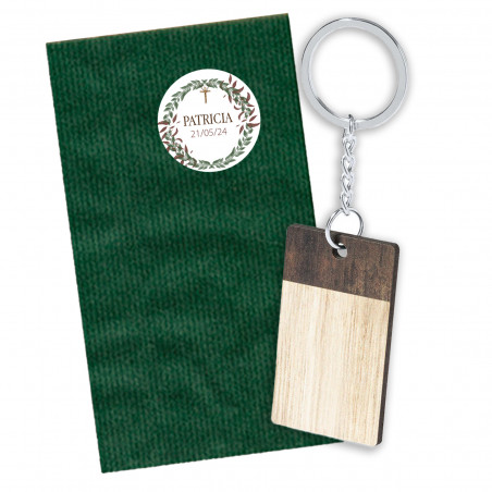 Portachiavi in legno bicolore in busta kraft verde con adesivo personalizzato