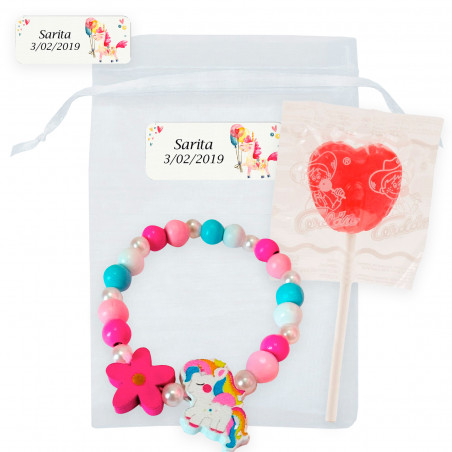 Bracciale unicorno con lecca-lecca in un sacchetto di organza personalizzato per i dettagli