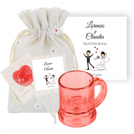 Bicchierino da shot rosso con lecca-lecca personalizzato e biglietto di ringraziamento in un sacchetto di stoffa decorato per