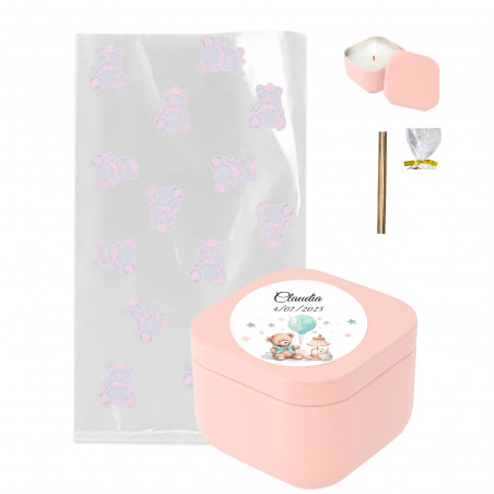 Candela personalizzata in un sacchetto decorato con orsacchiotti rosa e una chiusura dorata per i dettagli del battesimo