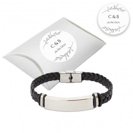 Bracciale in acciaio per uomo presentato in una scatola argentata di cartone con adesivo personalizzato per eventi