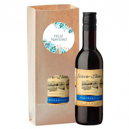Vino rosso in sacchetto kraft personalizzato con adesivo natalizio per dettagli