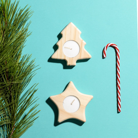Candele con figure natalizie stella e albero di natale