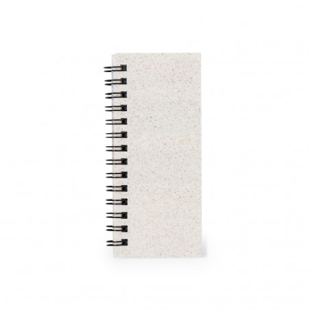 Blocco note con fogli a strisce bianche e post it