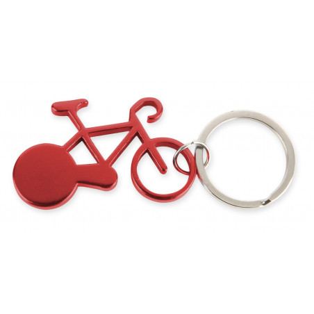 Portachiavi a forma di bicicletta presentato in una busta con patella adesiva e adesivo erbaceo personalizzabile