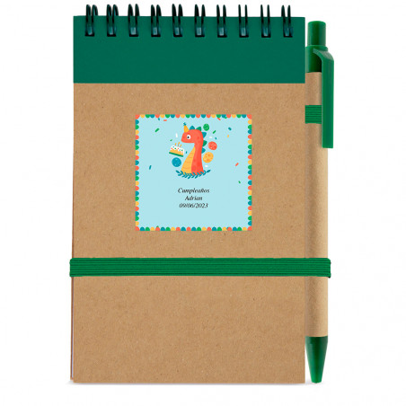 Quaderno con penna con adesivo design dinosauro per dettagli