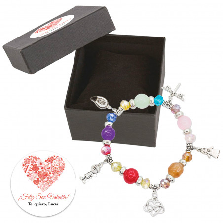 Bracciale con charms in un elegante scatola con romantico adesivo per i dettagli