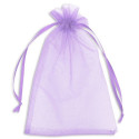 Bracciale con pony e adesivi e pompon in sacchetto di organza viola con adesivo personalizzato per dettagli evento bambini