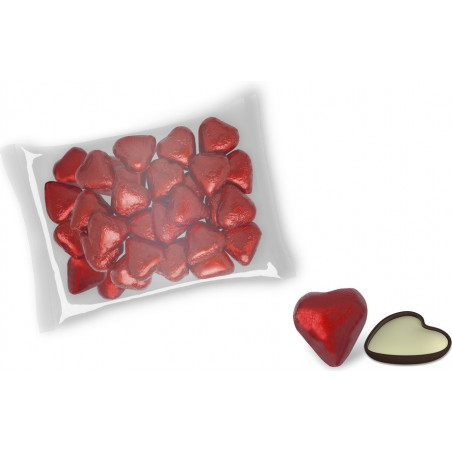 Cioccolatini a forma di cuore in busta rossa e romantico adesivo da regalare