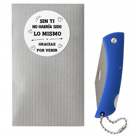 Coltello blu con busta kraft e adesivo di ringraziamento