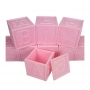 Scatola con motivi per bambini riempita di confetti